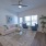 living room with couch and windows